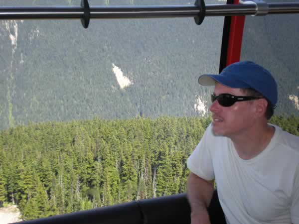 Soaring above the tree tops. Blackcomb Mountain is just ahead.