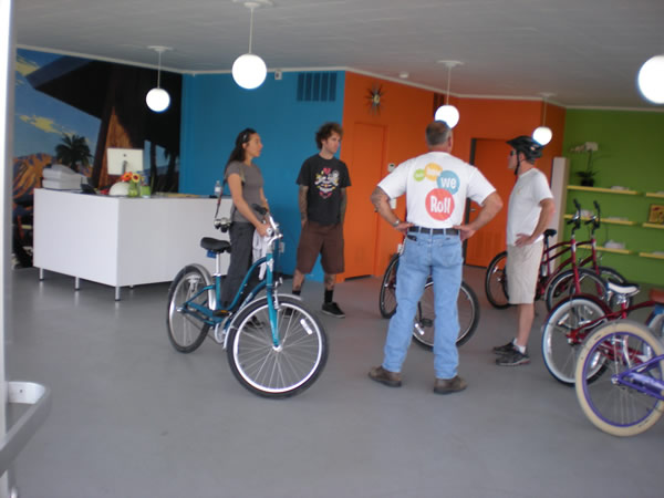 At the bike shop, getting rental bikes for Caz & Christina.